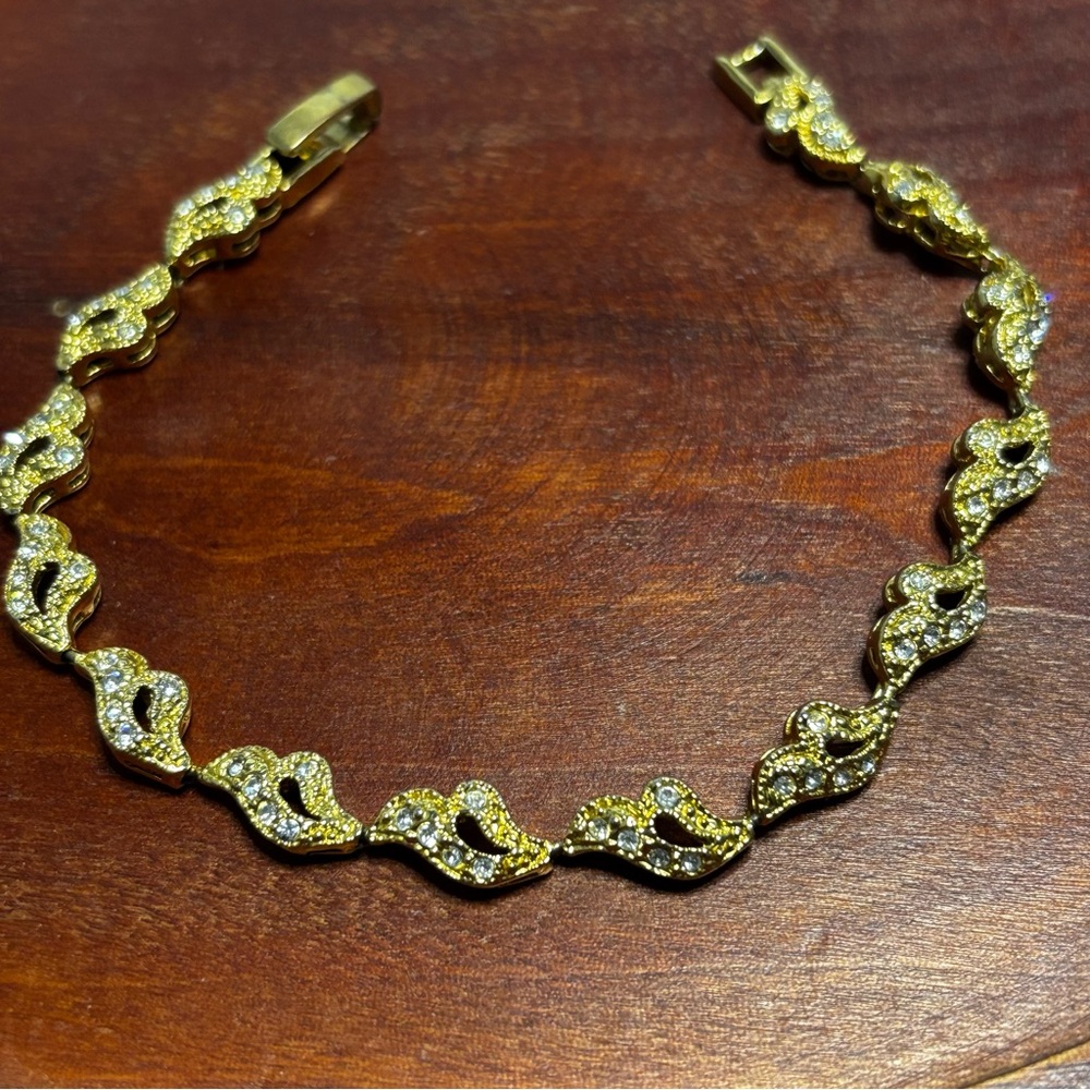 Napier Gold Tone Tennis Bracelet with Sparkling Accents